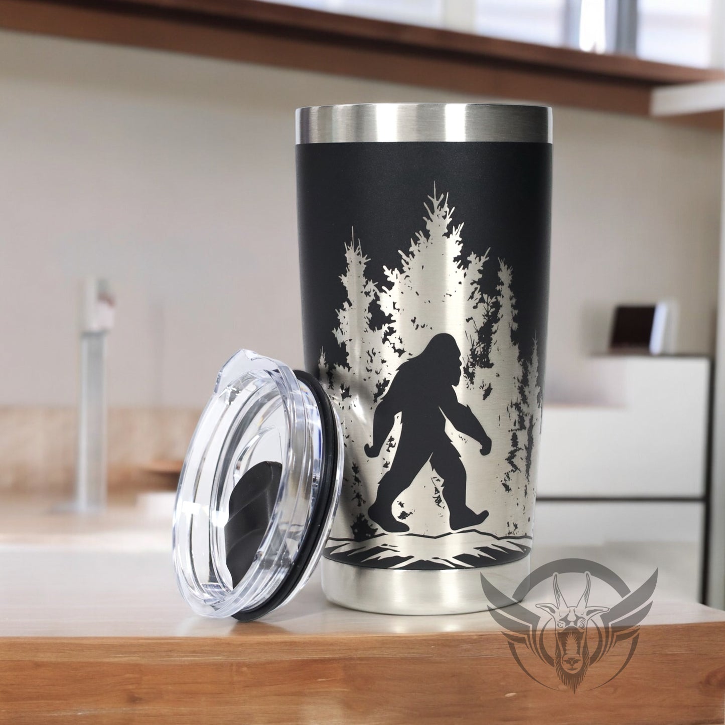 20oz Sasquatch in the trees graphic engraved tumbler.