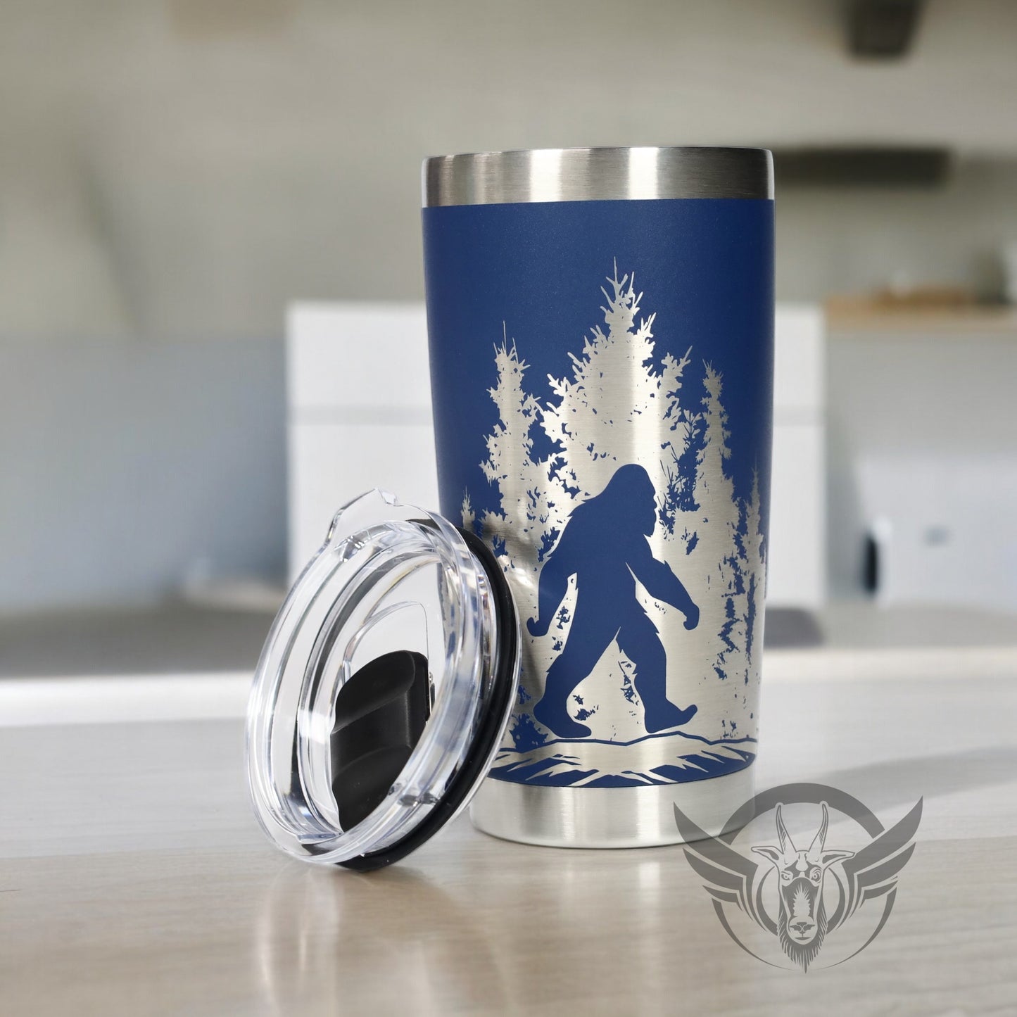 20oz Sasquatch in the trees graphic engraved tumbler.