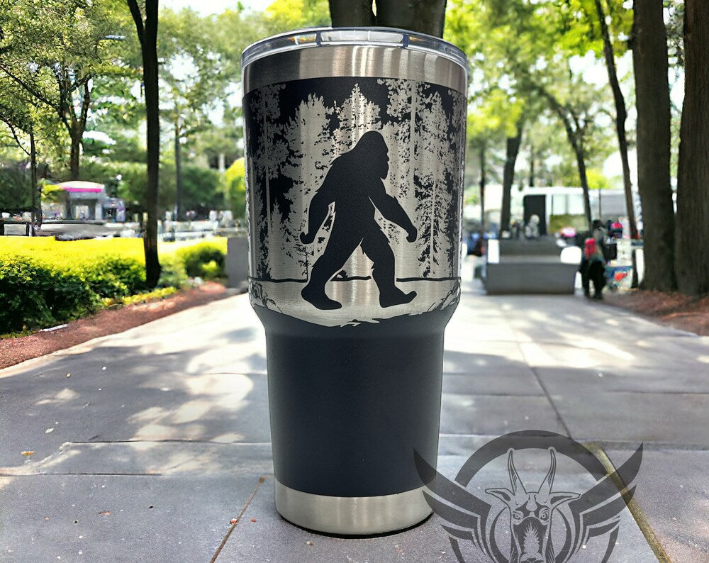 30oz Tumbler with Sasquatch walking in the trees graphics